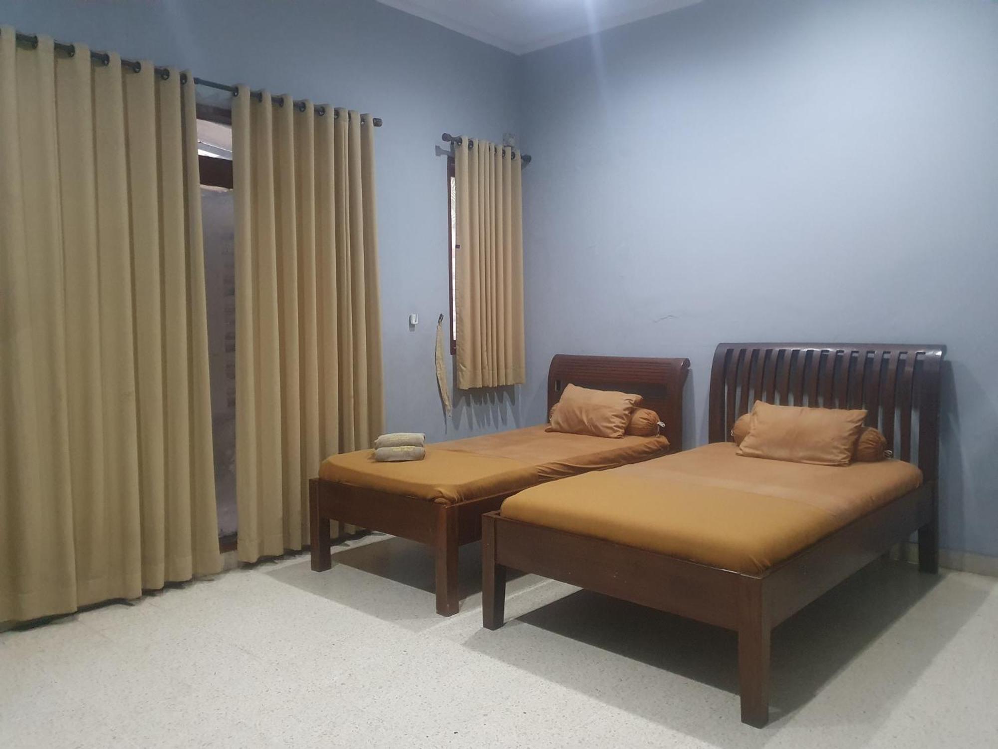 Ruang Tidur At Dpalma Bogor Hotel Exterior photo